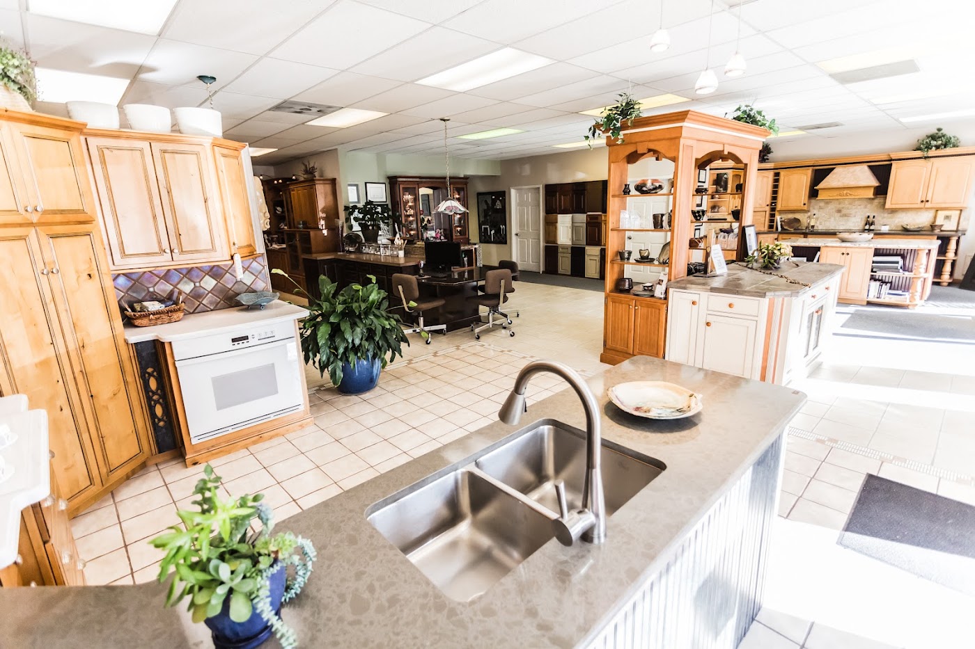 The Armstrong Kitchens showroom floor in Overland Park with display kitchens